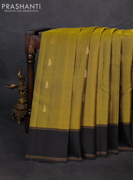 Pure soft silk saree mehendi green and black with allover silver zari weaves and rettapet zari woven border