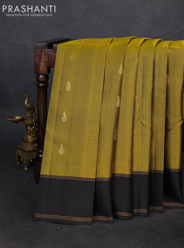 Pure soft silk saree mehendi green and black with allover silver zari weaves and rettapet zari woven border