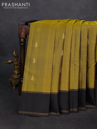 Pure soft silk saree mehendi green and black with allover silver zari weaves and rettapet zari woven border