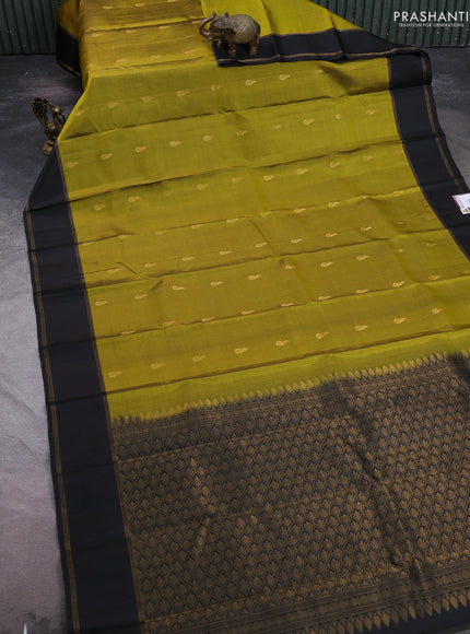 Pure soft silk saree mehendi green and black with allover silver zari weaves and rettapet zari woven border