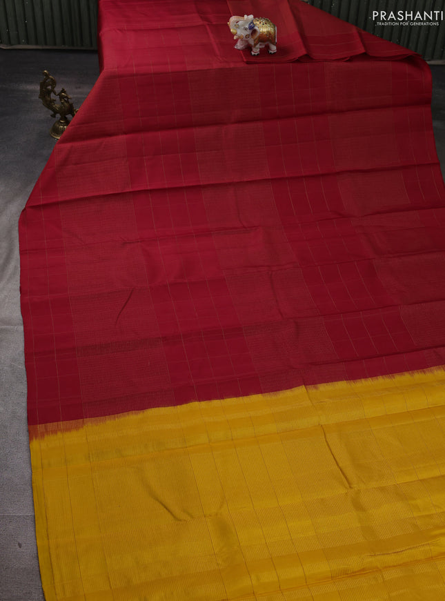 Pure soft silk saree red and yellow with allover zari woven small checked pattern and zari woven checked border