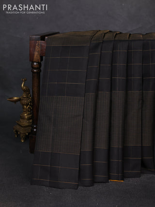 Pure soft silk saree black and yellow with allover zari woven small checked pattern and zari woven checked border