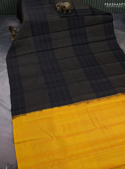 Pure soft silk saree black and yellow with allover zari woven small checked pattern and zari woven checked border