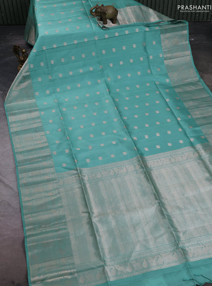 Pure soft silk saree mild teal green with allover zari woven buttas and long zari woven border