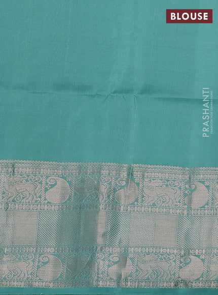 Pure soft silk saree mild teal green with allover zari woven buttas and long zari woven border