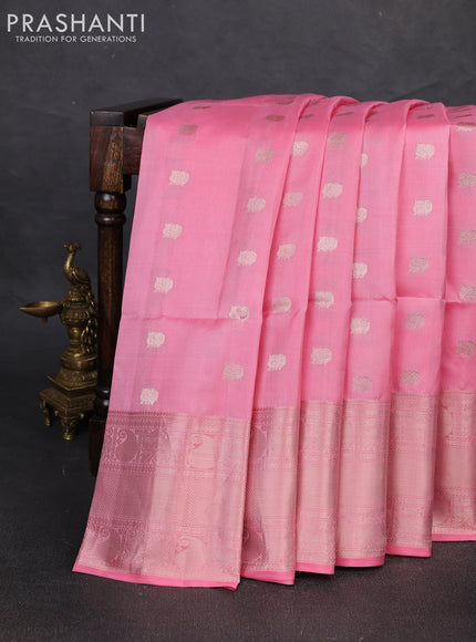 Pure soft silk saree light pink with allover zari woven buttas and long zari woven border