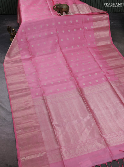 Pure soft silk saree light pink with allover zari woven buttas and long zari woven border