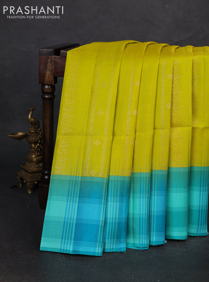Pure soft silk saree lime yellow and teal blue with allover zari weaves & buttas and long simple border
