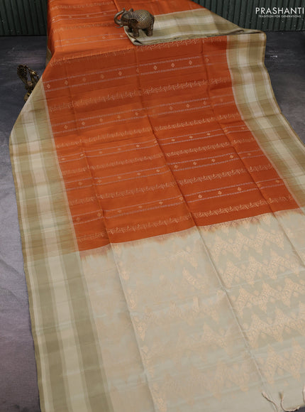 Pure soft silk saree honey shade and beige with allover zari weaves & buttas and long simple border