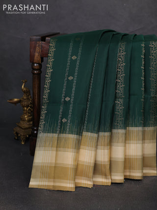 Pure soft silk saree bottle green and beige with allover zari weaves & buttas and long simple border