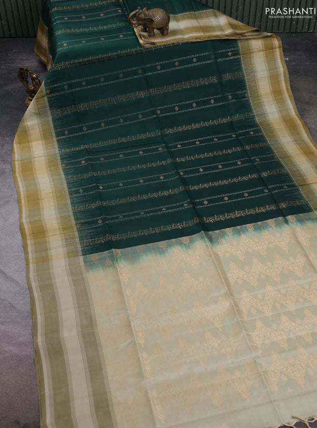 Pure soft silk saree bottle green and beige with allover zari weaves & buttas and long simple border