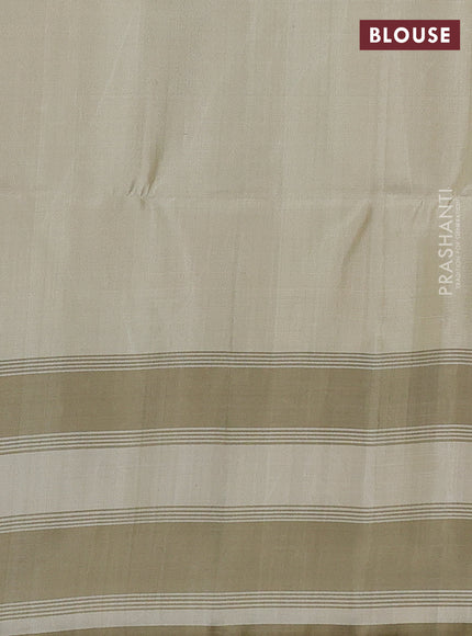 Pure soft silk saree bottle green and beige with allover zari weaves & buttas and long simple border