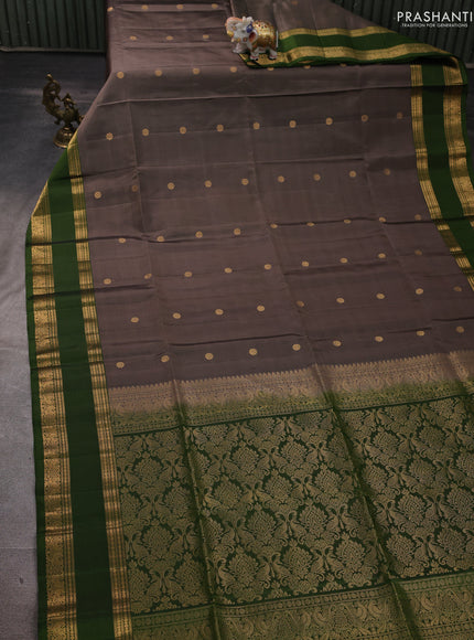 Pure soft silk saree chikku shade and mehendi green with zari woven buttas and rettapet zari woven border