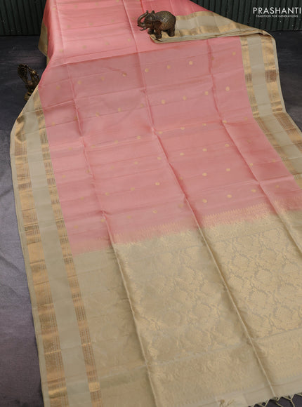 Pure soft silk saree peach shade and beige with zari woven buttas and rettapet zari woven border