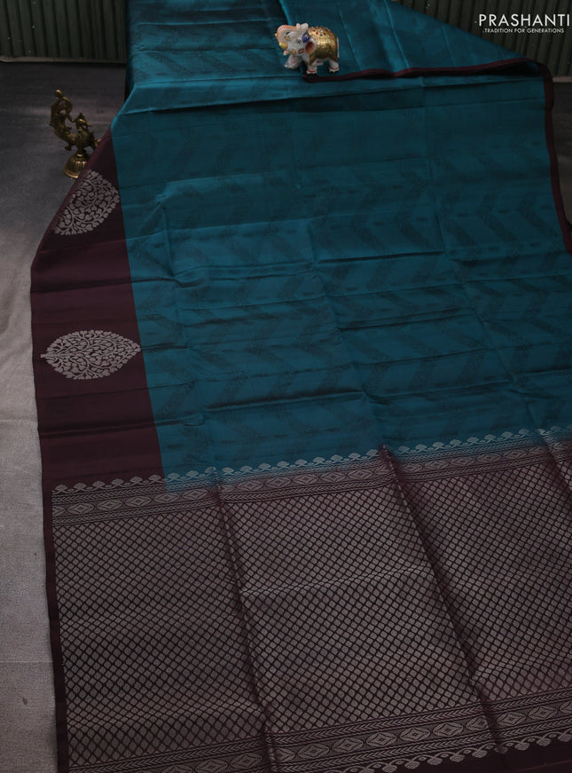 Pure soft silk saree peacock green and deep wine shade with allover weaves and silver zari woven butta border
