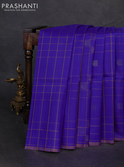 Pure soft silk saree violet and pastel peach with allover checks & zari buttas and piping border