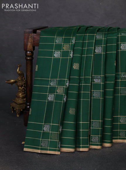 Pure soft silk saree green and sandal with allover checks & zari buttas and piping border