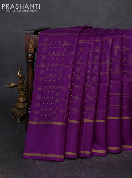 Pure soft silk saree purple with allover zari checks & buttas and rettapet zari woven border