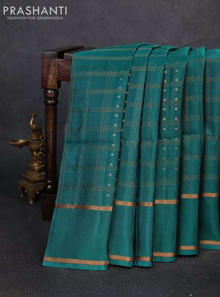 Pure soft silk saree teal green with allover zari checks & buttas and rettapet zari woven border