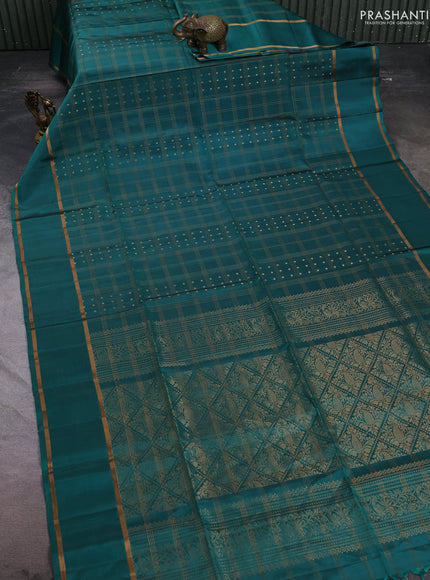 Pure soft silk saree teal green with allover zari checks & buttas and rettapet zari woven border