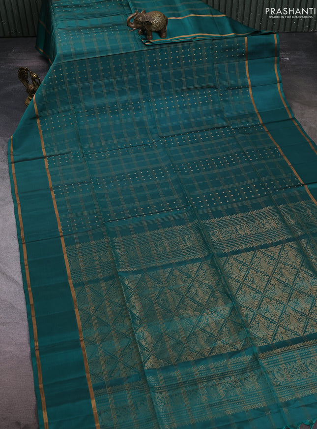 Pure soft silk saree teal green with allover zari checks & buttas and rettapet zari woven border