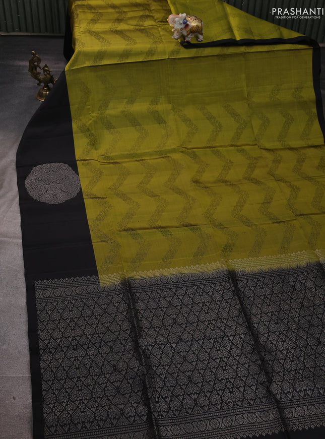 Pure soft silk saree olive green and black with allover weaves and silver zari woven butta border