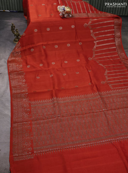 Banarasi semi matka silk saree orange with allover thread & zari woven buttas and woven border