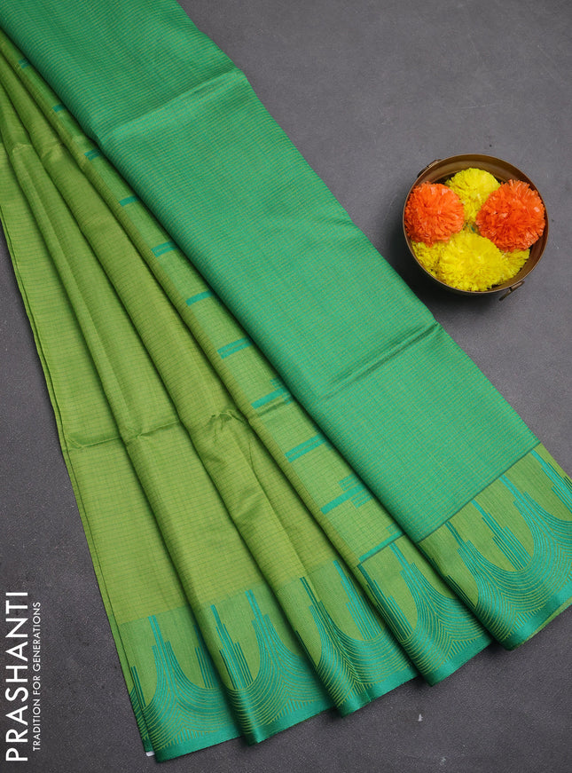 Semi dupion saree light green and teal green with allover thread stripe pattern and temple design thread woven border