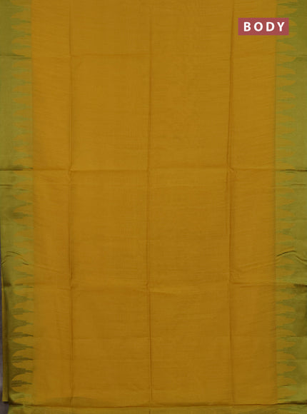 Semi dupion saree mustard yellow and light green with allover thread stripe pattern and temple design thread woven border