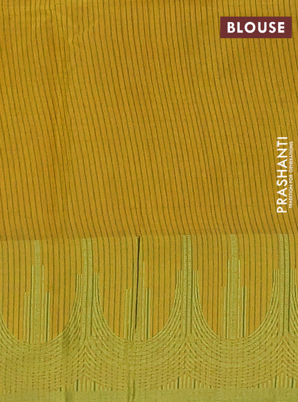 Semi dupion saree mustard yellow and light green with allover thread stripe pattern and temple design thread woven border