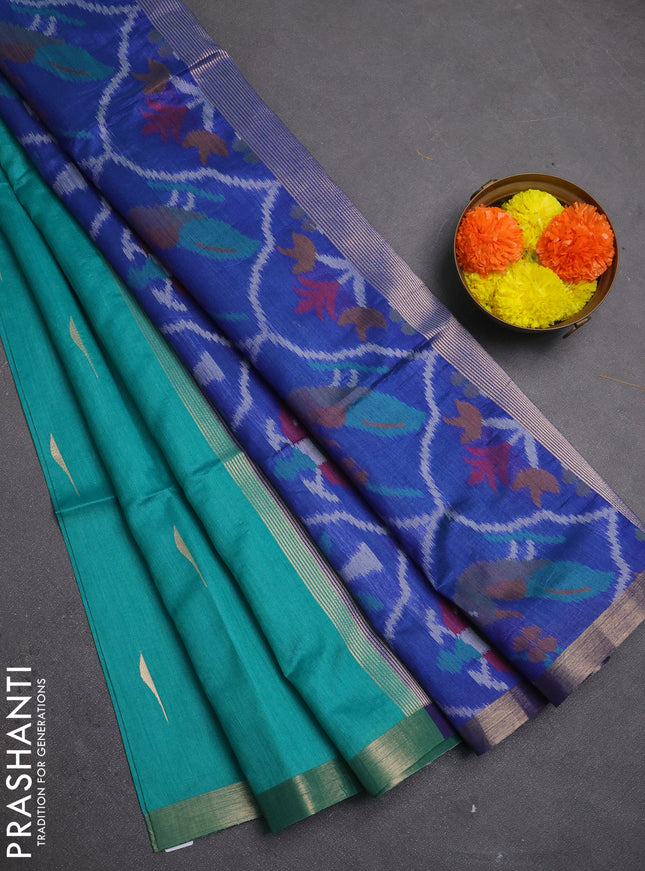 Semi dupion saree teal green and blue with allover zari woven buttas and zari woven border