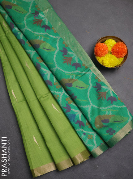 Semi dupion saree light green and teal green with allover zari woven buttas and zari woven border