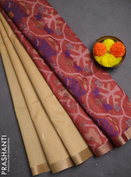 Semi dupion saree beige and maroon with allover zari woven buttas and zari woven border
