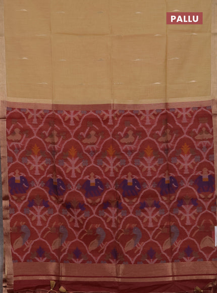Semi dupion saree beige and maroon with allover zari woven buttas and zari woven border
