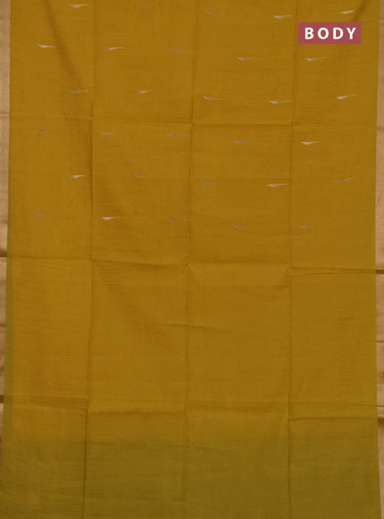 Semi dupion saree mustard yellow and light green with allover zari woven buttas and zari woven border