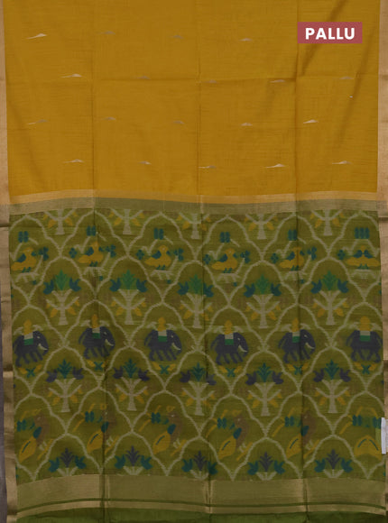 Semi dupion saree mustard yellow and light green with allover zari woven buttas and zari woven border