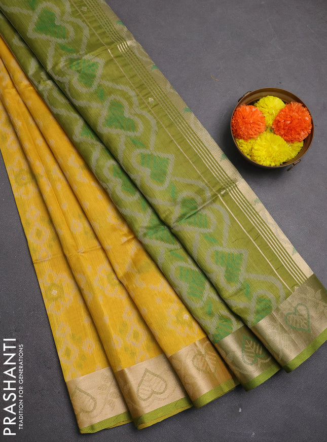 Semi dupion saree mustard yellow and light green with allover thread weaves pattern and zari woven border