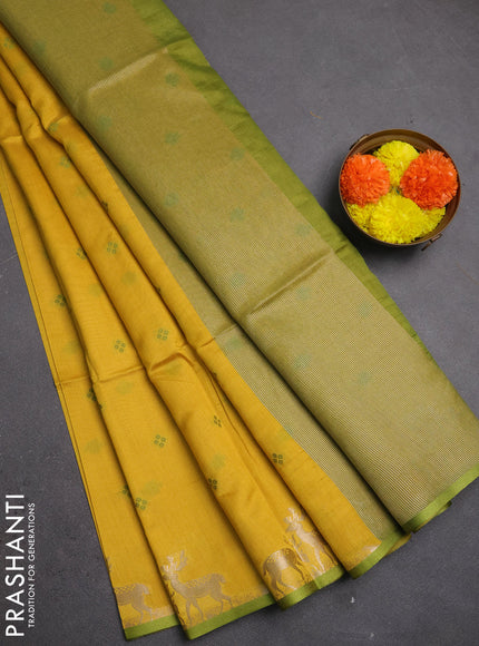 Semi dupion saree mustard yellow and light green with allover bandhani thread woven buttas and zari woven butta border