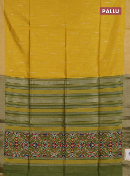 Semi dupion saree mustard yellow and light green with allover zari woven buttas and zari woven border