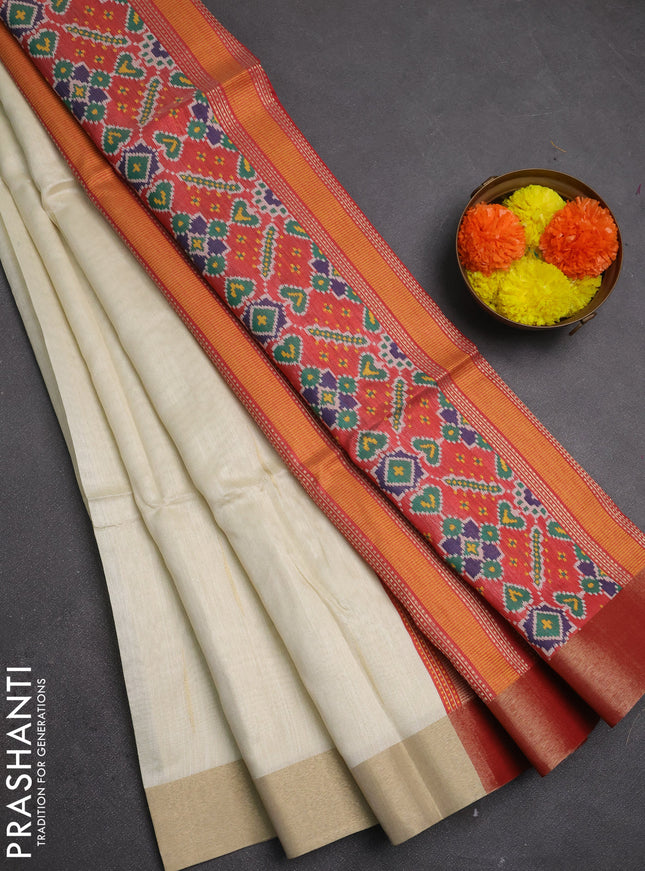 Semi dupion saree cream and red with allover zari woven buttas and zari woven border