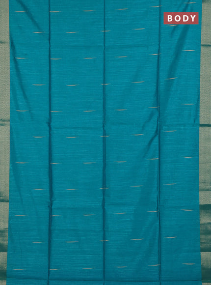 Semi dupion saree teal green and blue with allover zari woven buttas and zari woven border