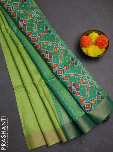 Semi dupion saree light green and green with allover zari woven buttas and zari woven border
