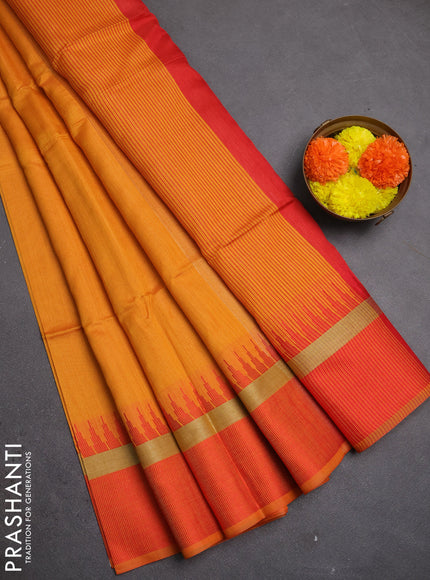 Semi dupion saree sunset orange and red with plain body and temple design woven border