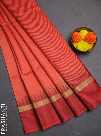 Semi dupion saree peach orange and maroon with plain body and temple design woven border