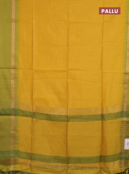 Semi dupion saree mustard yellow and light green with plain body and temple design woven border