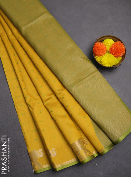 Semi dupion saree mustard yellow and light green with allover bandhani thread woven buttas and zari woven butta border