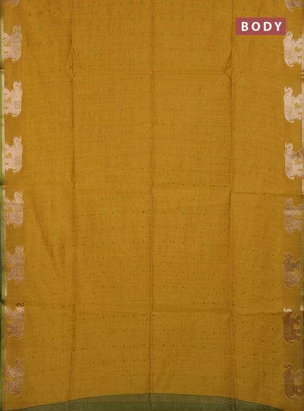 Semi dupion saree mustard yellow and light green with allover bandhani thread woven buttas and zari woven butta border
