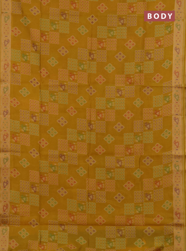 Semi dupion saree mustard yellow with allover thread woven buttas and woven border