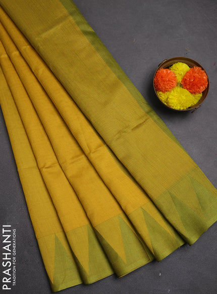 Semi dupion saree mustard yellow and light green with allover thread stripe pattern and temple design thread woven border