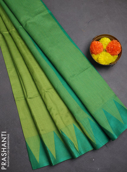 Semi dupion saree light green and teal green with allover thread stripe pattern and temple design thread woven border